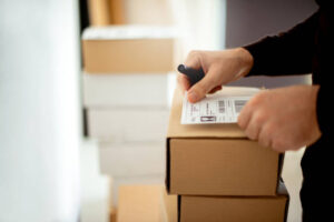 Delivery service, applying a shipping label